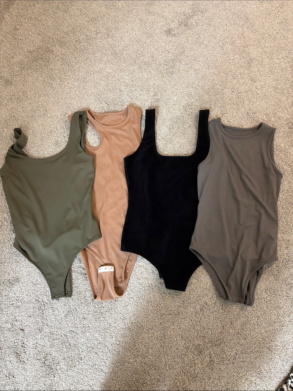 Bundle of 4 bodysuits different sizes and brands
